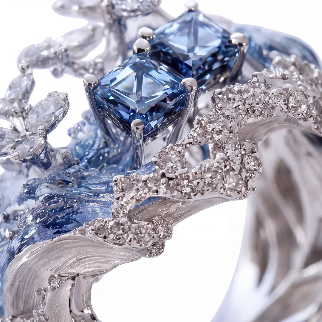 Aiko Tanaka High Jewelry No. 001 close-up, blue square-cut stones set among silver waves and pavé crystals