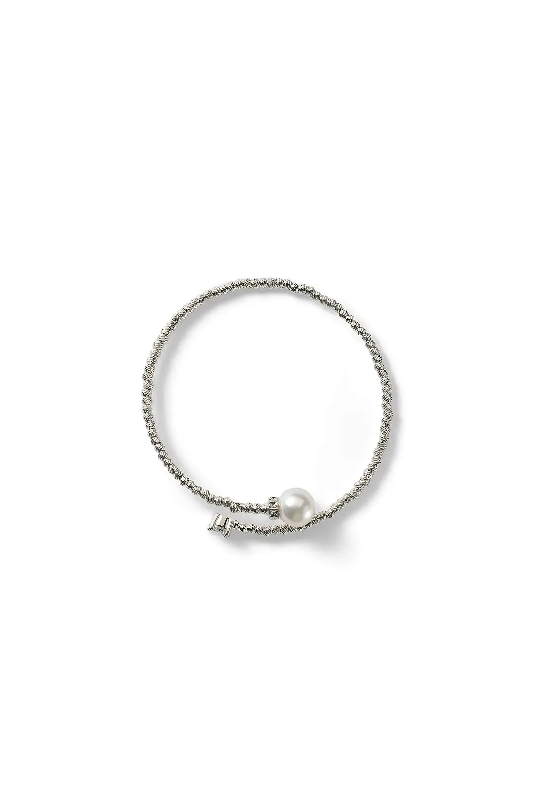 Aiko Tanaka Tsunagu bracelet seen from above, a slim silver crystal cuff with a white pearl, white background