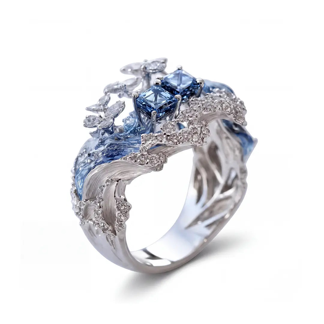 Aiko Tanaka High Jewelry No. 001 ring, a sculpted silver wave band topped with blue square stones and crystals