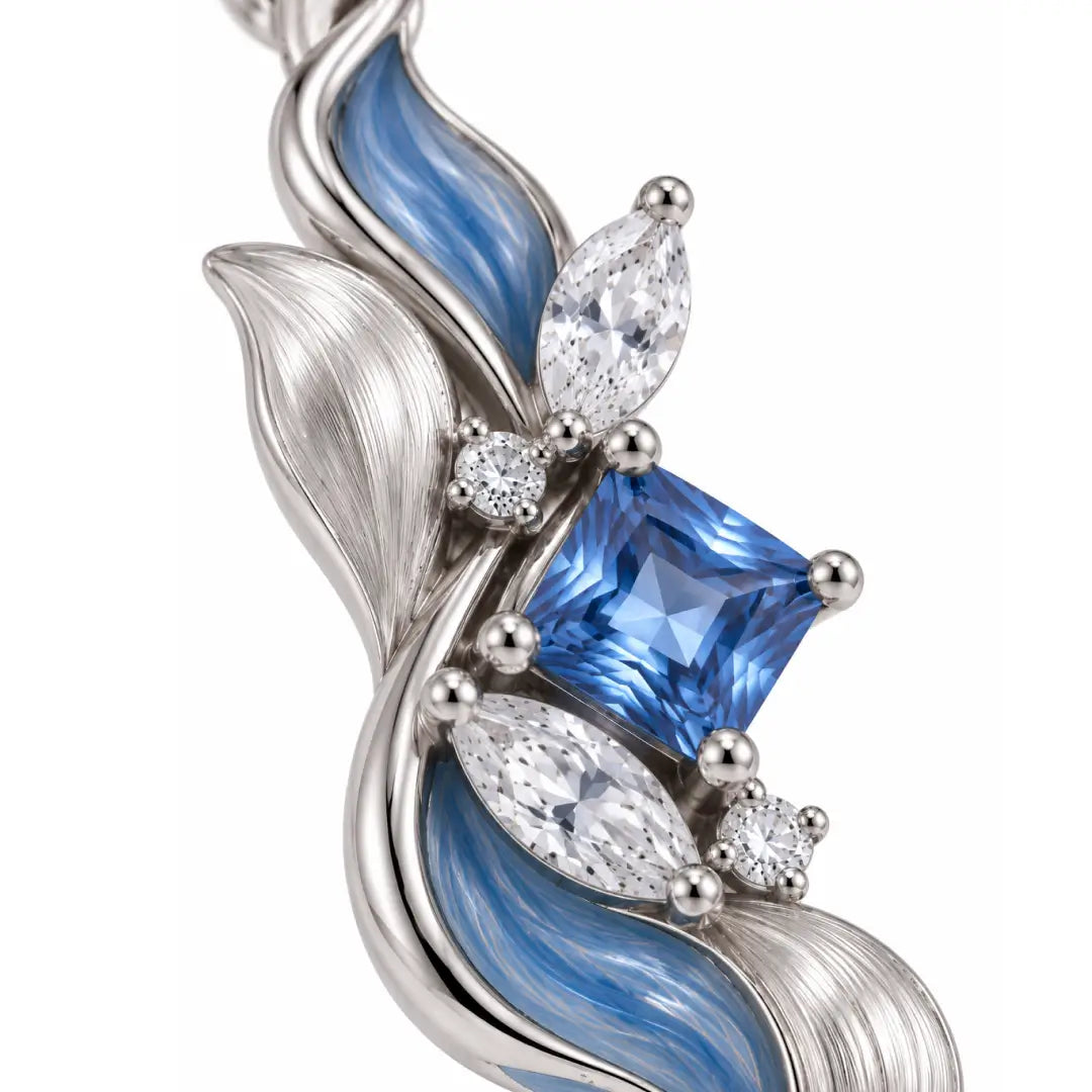 Aiko Tanaka High Jewelry No. 023 pendant close-up, a square blue stone among silver and blue enamel waves