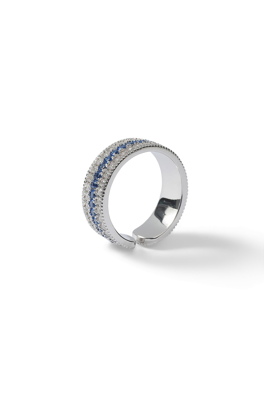 Aiko Tanaka Kiseki ring in silver with channel-set blue stones shown from the side on a white background