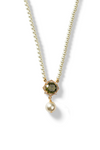 Aiko Tanaka Hasuike necklace, a gold beaded chain with a green stone pendant and a pearl drop, white background
