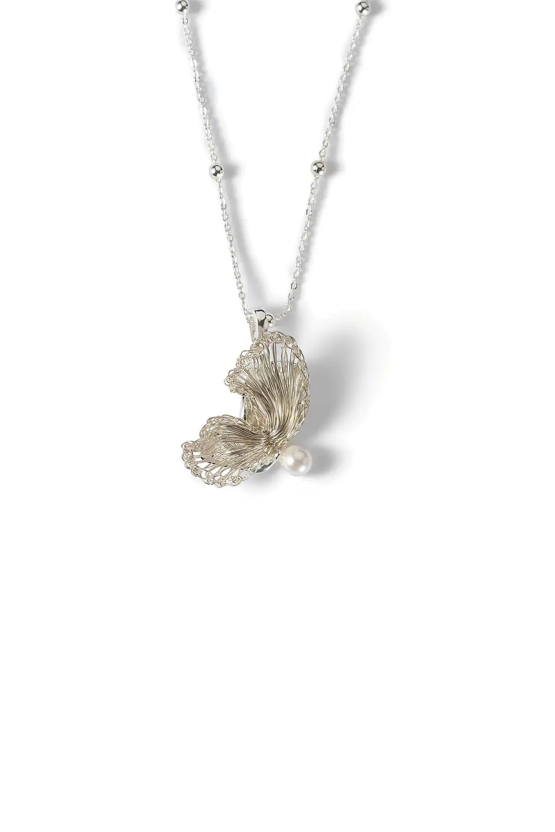 Aiko Tanaka Hakucho necklace, a silver feather wing pendant with a pearl on a beaded chain, white background