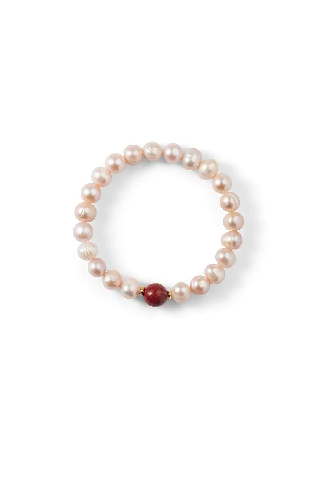 Aiko Tanaka Kurenai bracelet seen from above, a circle of pink freshwater pearls with a red bead, white background