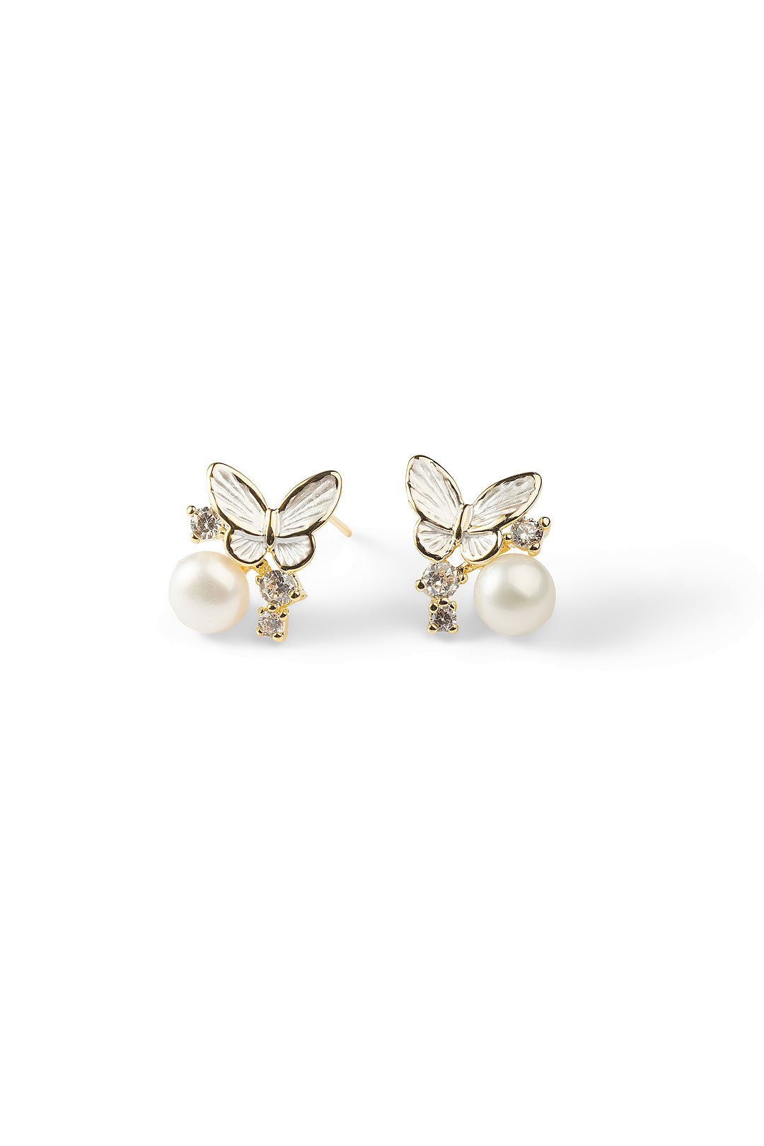 Aiko Tanaka Yuki Cho earrings, gold butterflies with mother-of-pearl wings above white pearls, on white